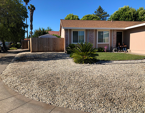 A vast neatly-shaped section of rock on the corner of the block in central Napa